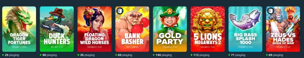 Grid of slot games like Duck Hunters and Gold Party, showing current player counts on the site.